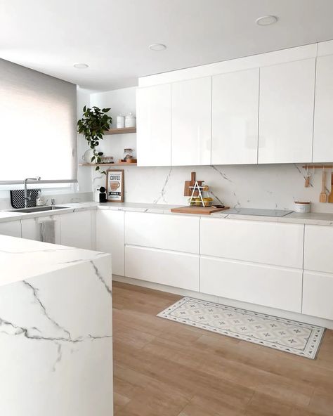 21+ Cleanest All-White Kitchen Design Inspirations For 2024 - DrExplains White Kitchen Handleless, White Modern Cabinets Kitchen, White Colour Kitchen Design, White Kitchen No Handles, Modern Kitchen Design White Cabinets, Bright White Kitchen Ideas, White Kitchen Update, Kitchens With White Countertops, L Shaped White Kitchen