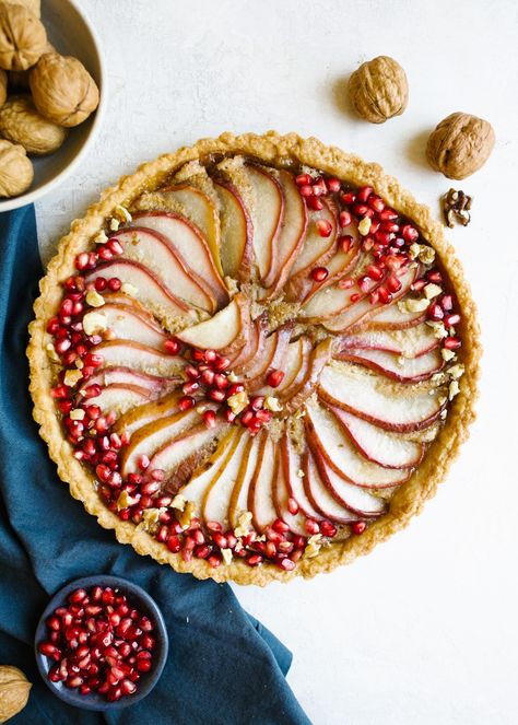 This brown butter peat tart has a sweet pastry crust, a brown butter custard, and a layered pear filling. Pear Filling, Holiday Tarts, Red Pears, England Coast, Tart Dough, Leftover Dough, Sweet Pastry, Pear Tart, Tart Filling