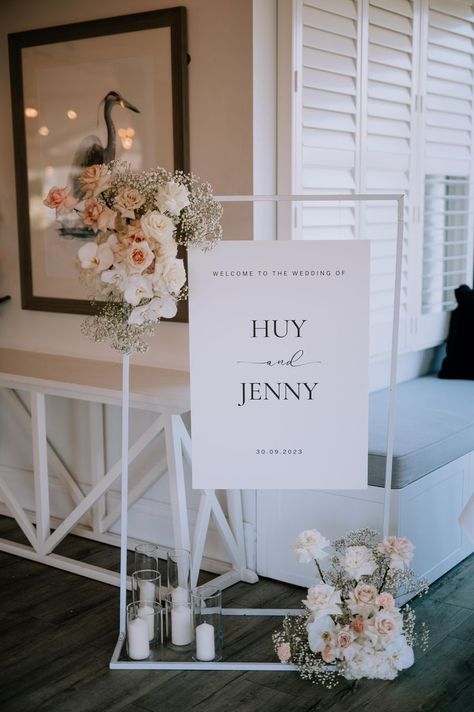 Love the 2 small floral clusters adorning this welcome sign and the candles add the glamoiur when lit! Photography📸 Single Soul Wedding Entrance Sign With Flowers, Wedding Welcome Sign Easel, Welcome Sign Florals, Floral Signage, Bramleigh Estate, Venue Entrance, Engagement Photo Shoot Poses, Village Aesthetic, Wedding Entrance Sign