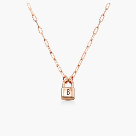 Fit Guide Safety Policy Care InstructionsThe Initial Lock Necklace in Rose Gold Plating was created for those who love to experiment with their style by linking up their look. This chain link necklace is a classic chain link with an added twist with its unique lock pendant for an edgier look to your outfit.Customize me! Customize this piece with up to 3 letters (all capitals).How to make it yours? Choose 3 initials such as first, middle, and last name.How we wear it: Pair this necklace from ... Lock Charm Necklace, Safety Policy, Floating Diamond Necklace, Necklace With Diamond, Lock Pendant, Lock Necklace, 3 Letter, Trendy Necklaces, Gold Necklace Women