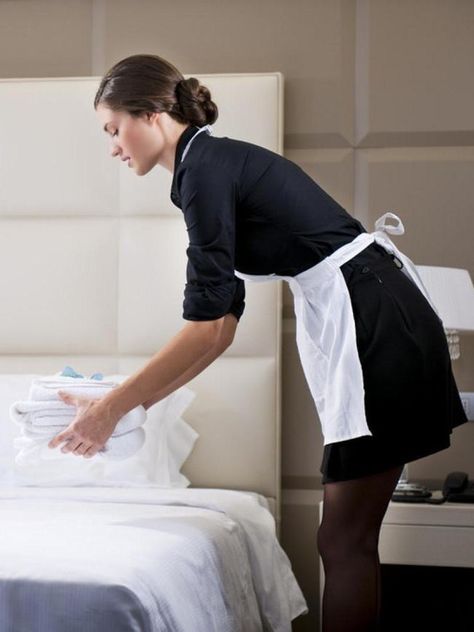 30 Hotel Secrets the Front Desk Doesn't Want You to Know Front Desk Hotel, Housekeeping Uniform, Hotel Housekeeping, Hotel Worker, Hotel Secrets, Hotel Uniform, Staff Uniforms, Maid Uniform, Front Office