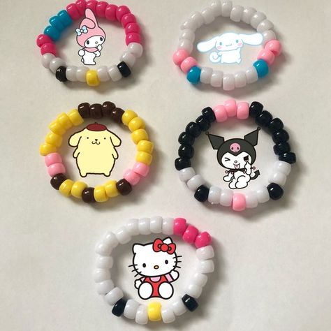 Handmade Sanrio kandi bracelets Sanrio Bracelet Ideas, Sanrio Kandi, Kuromi And Hello Kitty, Hello Kitty Bracelets, Pompompurin Kuromi, Sanrio Jewelry, Rave Bracelets, Cinnamoroll Pompompurin, My Melody Cinnamoroll