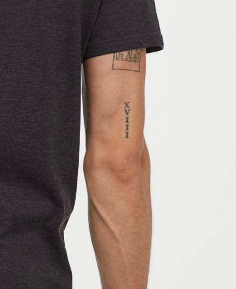 Pin by Drew on Татуировки | Tricep tattoos, Writing tattoos, Wrist tattoos for guys Minimal Bicep Tattoo Men, Tricep Men Tattoo, I Am > I Was Tattoos, Tatoos Minimaliste Men, Guys Tattoos Arm, Bicep Line Tattoo, Small Tattoo Placement Men, Men’s Tattoo Placement, Single Tattoos Men