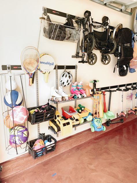 Garage Weight Rack, Fasttrack Garage Ideas, Rubbermaid Fast Track Garage Ideas, Rubbermaid Garage Organization, Stroller Storage Ideas, Rubbermaid Fast Track Garage, Garage Organization Bikes, Garage Building Ideas, Garage Workspace