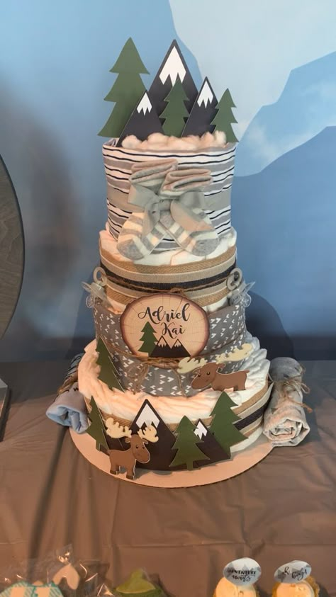 Woodland Theme Diaper Cake Boy, Let The Adventure Begin Baby Shower Cake, Adventure Awaits Baby Shower Ideas Boy, Woodland Theme Diaper Cake, Woodland Diaper Cake Ideas, Adventure Baby Shower Cake, Outdoorsy Baby Shower Ideas, Forest Baby Shower Cake, Mountain Themed Baby Shower Ideas