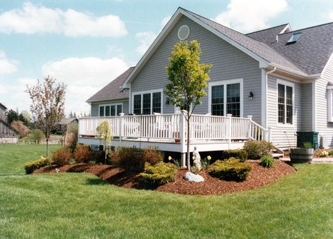 The raised bed would look nice around our deck Pergola Accessories, Deck Landscaping Ideas, Raised Porch, Fynbos Garden, Deck Refresh, Landscaping Around Deck, Deck Landscaping, Landscaping Around House, Landscaping Around Trees