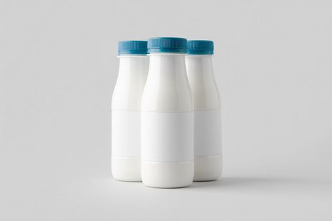 White plastic yogurt or milk bottle mockup with blank label. Plastic Milk Bottles, Milk Jar, Plastic Milk, Blank Labels, Work Art, Bottle Mockup, Milk Bottle, Plastic Bottles, Reusable Water Bottle