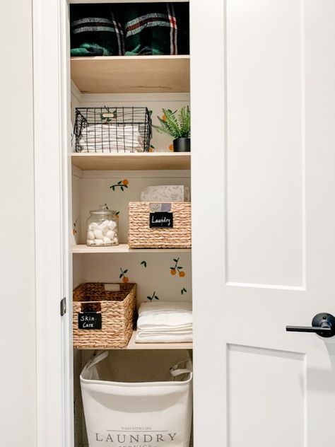 Easy Small Linen Closet Makeover on a Budget - Fun Home Building Sliding Door Linen Closet, Small Linen Closet Ideas In Bathroom, Small Linen Closet Door Ideas, Linen Closet With Wallpaper, Bathroom Linen Closet Door Ideas, Linen Closet No Door, Small Linen Closet Makeover, Narrow Deep Closet Ideas, Linen Closet Makeover Hallways