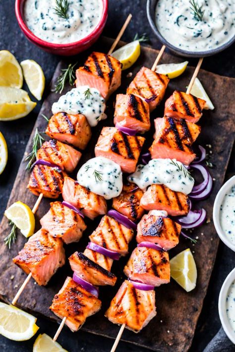 Grilled Salmon Skewers With Creamy Dill Yogurt Sauce Recipe

Ingredients

- 1 pound salmon fillet, cut into 1-inch cubes
- 2 tablespoons olive oil
- 1 tablespoon lemon juice
- 1 teaspoon garlic powder
- 1 teaspoon smoked paprika
- Salt and pepper to taste
- 1/2 cup Greek yogurt
- 2 tablespoons fresh dill, chopped
- 1 tablespoon lemon zest
- 1 tablespoon lemon juice (for sauce)
- Skewers (if using wooden skewers, soak in water for 30 minutes)

Full Cooking Instructions on... Dill Yogurt Sauce, Yogurt Sauce Recipe, Salmon Skewers, Hot Cocoa Mix Recipe, Wooden Skewers, Salmon Fillet, Grilled Asparagus, Yogurt Sauce, Different Vegetables