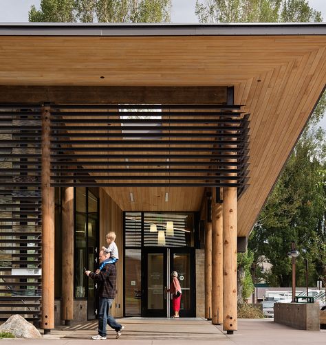 Demarcating the northern entrance to Jackson, Wyoming’s historic downtown, the Home Ranch Welcome Center serves as a community hub for both residents and v Welcome Center, Rural Land, Community Hub, Jackson Wyoming, Building Entrance, Community Halls, Harbor House, Public Restroom, Best Architects