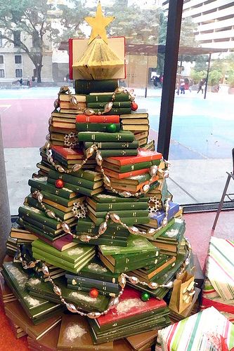 Book tree. A novel idea on creating your tree. Happy Holiday! Photo taken at the Houston Public Library Central Library (stylized), 2013. To contact HPL visit www.houstonlibrary.org or call 832-393-1313. Book Christmas Tree, Library Book Displays, Plastic Christmas Tree, Book Tree, How To Make Christmas Tree, Creative Christmas Trees, Alternative Christmas Tree, Central Library, Ultimate Christmas