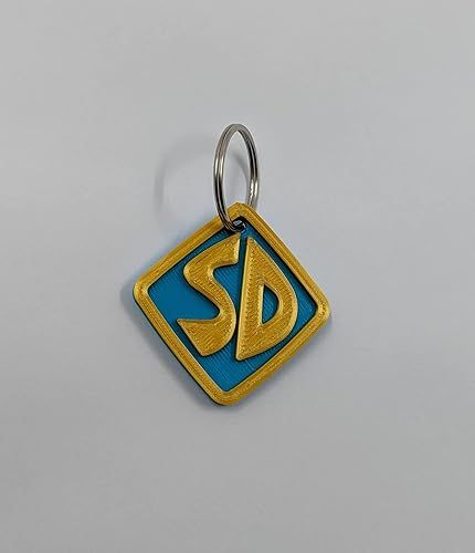 Get your Scooby Doo Dog Collar Tag! The Tag measures approx. 1.9 inches tall x 1.9" wide and .20 inches thick and comes with a 1" keyring to attach to a collar. 3D printed in PLA Plastic. Printed in the Scooby Doo colors, not painted. These are printed in PLA Plastic, due to the nature of 3d Printing there may be slight imperfections. Scooby Doo Dog Collar, Scooby Collar, Scooby Doo Dog Tag, Scooby Doo Collar, Bracelet Tattoo Ideas, Cartoon Scooby Doo, Scooby Dog, Dog Costume Halloween, Charm Bracelet Tattoo