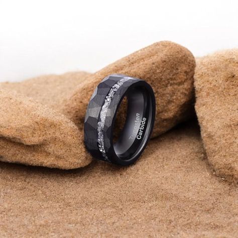 A bold statement with this Meteorite Inlay Black Hammered Ring, a perfect fusion of modern style and celestial charm. Crafted from durable black tungsten, this ring features a stunning meteorite inlay, adding a touch of cosmic elegance to its rugged hammered texture. Designed for those who appreciate uniqueness, this wedding band is perfect for men who seek a distinctive and meaningful ring. Features: ✔ Premium Black Tungsten - Scratch-resistant, durable, and built to last. ✔ Genuine Meteorite I Meaningful Rings, Hammered Wedding Bands, Black Tungsten Rings, Black Tungsten, Hammered Rings, Men's Wedding Ring, Unique Wedding Bands, Wolfram, Tungsten Ring