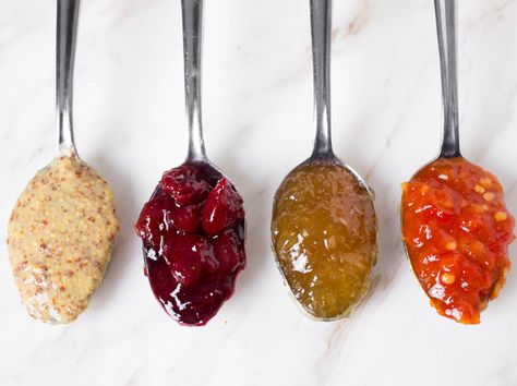 A great condiment pairing elevates the flavor of cheese by contrasting its saltiness with some sugar, bringing out unexpected notes like grassiness or nuttiness, or adding textural complexity to each mouthful. It can help cut a cheese's richness with acidity or spice, or balance its funk and earthiness with sweetness. Here are six diverse condiments to make any cheese plate shine. Cheese Plates Appetizer, Cheese Trays, Charcuterie Plate, Wine And Cheese Party, Charcuterie Inspiration, Charcuterie Platter, Charcuterie Cheese, Cheese Party, Charcuterie And Cheese Board