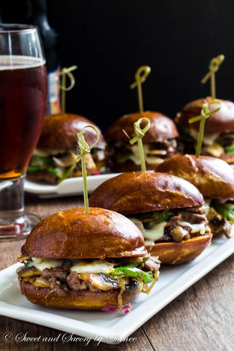 Messy little Philly cheese steak sliders are irresistibly cheesy and flavorful, perfect for your game day menu! Gourmet Sliders, Cheese Steak Sliders, Steak Sliders, Cheesesteak Sliders, Philly Cheese Steak Sliders, Philly Cheese, Cheese Steak, Philly Cheesesteak, Slider Recipes