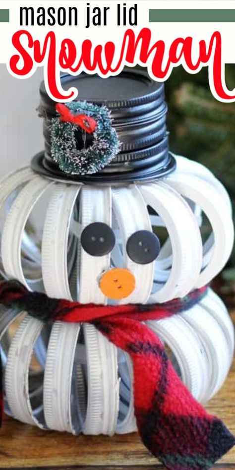 If you liked our Mason Jar Lid Pumpkins, you'll love this adorable mason jar lid snowman! It's a cute and unique holiday craft that is sure to be a conversation piece. #masonjar #masonjarlid #christmascrafts #christmasdecor #diychristmasdecor #winterdecor #wintercrafts #craftsbyamanda Mason Jar Lid Pumpkin Diy, Jar Lid Pumpkins Diy, Mason Jar Ring Pumpkin Diy, Canning Ring Snowman, Mason Jar Ring Snowman, Canning Jar Ring Snowman, What To Do With Mason Jar Lids, Canning Jar Ring Pumpkin, Mason Jar Lid Snowman