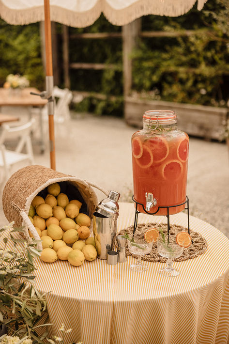 Non-alcoholic wedding drinks in glass dispenser with cocktail shaker and glasses with basket of lemons for Meditteranean inspired wedding | wedding drinks | wedding drinks ideas | Katie Goff Photography Non Alcoholic Drinks Wedding, Wedding Alcohol, Wedding Drink Station, Wedding Drink Menu, Glass Dispenser, Cocktail Hour Wedding, Drink Station, Grapefruit Juice, Drink Menu