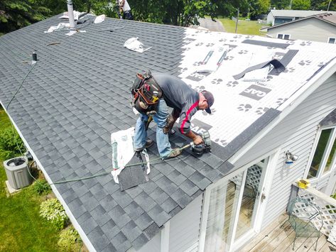 photo of a man installing a new gray roof Types Of Roof, Types Of Roofing Materials, Pavers Design, Leaky Roof, Patio Pavers Design, Home Remodeling Contractors, Roofing Ideas, Patio Pavers, Roofing Felt