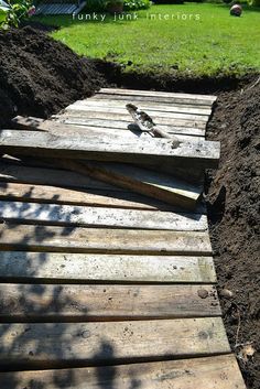 A pallet wood garden walkwayFunky Junk Interiors Pallet Walkway, Wood Walkway, Perfect Apartment, Reuse Ideas, Garden Therapy, Funky Junk Interiors, Garden Walkway, Pallet Garden, Have Inspiration