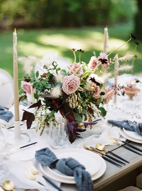 Knotted Napkins Soft, washed-linen napkins give your tablescape a soft, relaxed feel. Tie them in an elegant knot and place each napkin on guests’ salad plates, along with color-coordinating flatware to tie the wedding palette together. Reception Table Place Settings, Alfresco Wedding, Mismatched Bridesmaids, Unique Wedding Flowers, Wedding Floral Centerpieces, Santa Ynez, Connecticut Wedding, Wedding Palette, Dusty Blue Weddings