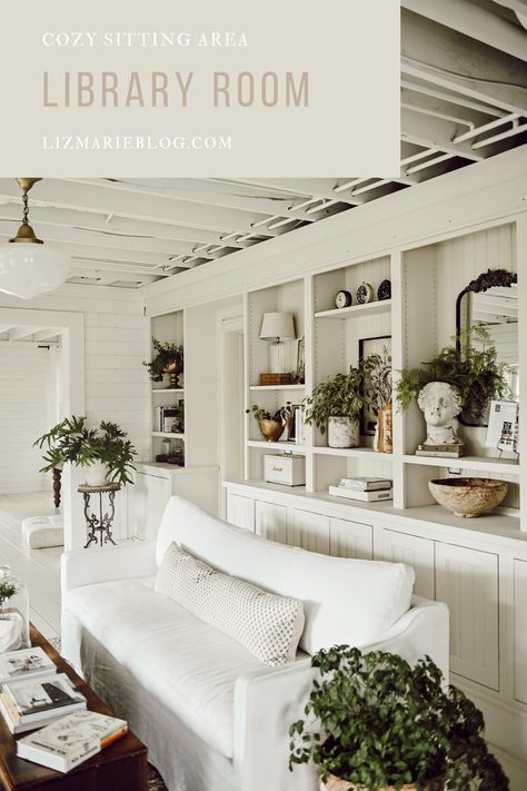 Library sitting room with cozy white sofa and vintage decor. #library #whitesofa #sixpennysofa #sittingarea #vintagedecor Library Sitting Room, Sitting Room Sofa, Painted Built Ins, Cozy White Cottage, White Built Ins, Cozy Sitting Area, Liz Marie, Liz Marie Blog, Fresh Farmhouse