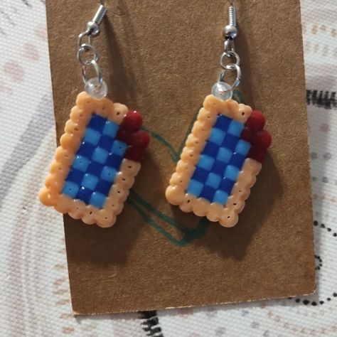 Blueberry Blue Colors Pop Tart Earrings Made From Perler Beads Perler Bead Patterns Cinnamoroll, Friendship Safety Pins Bead Patterns, Small Perler Earrings, Pearler Bead Jewelry Ideas, Perler Bead Earring Holder, Small Easy Perler Bead Patterns, Fused Beads Ideas, Peeler Earrings, Perler Beads Crafts