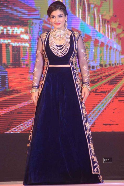 Raveena Tandan in Navy Blue Velvet Lehenga Choli with Long Jacket at IBJA Fashion Show Blue Velvet Lehenga, Bollywood Actress Saree, Velvet Lehenga Choli, Raveena Tandon, Velvet Lehenga, Indian Women Fashion, Lehenga Designs Simple, Velvet Dress Designs, Pakistani Wedding Outfits