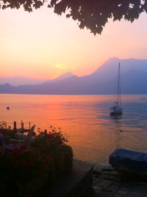 Sunset over Lake Como from my bedroom in Varenna (Janine Milne) Milan In Winter, Lake Como Boat Aesthetic, Lake Como Sunset, Riva Boat Lake Como, Lenno Lake Como, Italy Sunset, Italy Girl, Sunset Over Lake, Adventure Branding