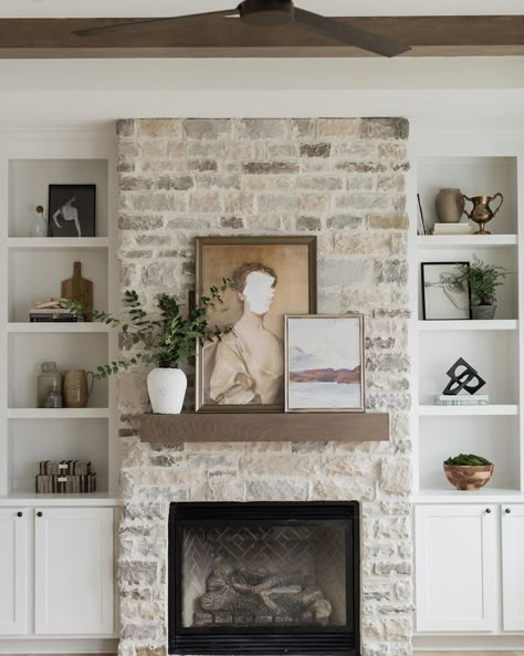 Oakstone Homes on Instagram: “We’ve been prepping all week for a photo shoot at one of our larger spec homes of the year. It turned out so pretty. Sneak a peek on our…” Stone Fireplace With White Built Ins, Built Ins With Stone Fireplace, Brick Vs Stone Fireplace, Flat Rock Fireplace, Stacked Stone Fireplace With Built Ins On Both Sides, Cottage Fireplace Ideas Farmhouse Style, How To Stone A Fireplace, Styling A Stone Fireplace Mantle, Stone Fireplace With Arched Built Ins