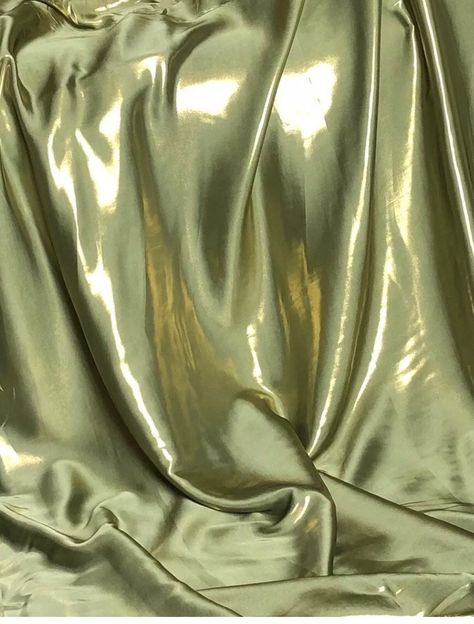 "Shimmer satin fabric :- shiny wet look satin fabric  olive green/gold in colour  its colour is sage green and has gold shimmer on it width is 58\" inches(147cm) soft feel medium weight smooth shiny fabric  can be used for multiple projects dresses,crafts,wedding,upholstery,bedding,table tops ,curtains,costumes, cushions etc this price is for one meter and if you will buy more than one meter it will come as one continuous length  please note that we try our best to get the actual colour of the f Green Gold Aesthetic, Green And Gold Dress, 21 Dinner, Olive Sage Green, Upholstery Bed, Olive Dress, Gold Aesthetic, Shiny Fabric, Gold And Green