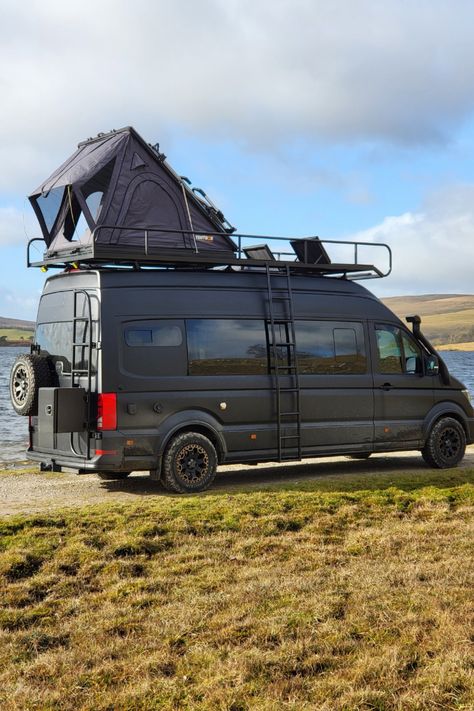 This is van life at its finest: MAN TGE 4x4 campervan, equipped with a bespoke roof rack, TentBox, external storage box, and built-in sun loungers on the roof deck.   This is 'The Lion', a custom van conversion build which sleeps and seats 5. The exterior is hot property, but the interior is as cool as a luxury ski chalet in The Alps.  If you dream of exploring in style and comfort, pin this as your ultimate camper van inspiration! Camper Van Roof Bed, Campervan For 4, Van Roof Ideas, Camper Van Roof Deck, Van Roof Deck, Mini Van Camper, Campervan Exterior, Ski Lodge Interior, Luxury Camper Van