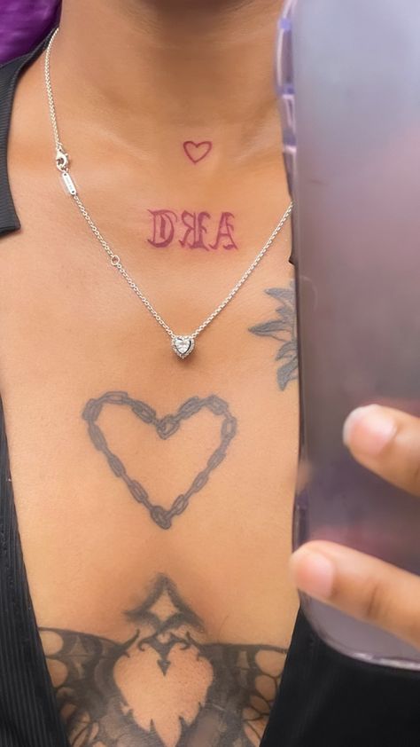 Baddie Chest Tattoo Female, Heart Tattoo On Chest Women, Collar Bone Tattoo Black Women, Heart Chest Tattoo, Small Chest Tattoos, Throat Tattoo, Neck Tattoos Women, Black Girls With Tattoos, Chest Piece Tattoos