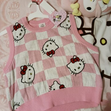 Hello Kitty Merch Aesthetic, Hello Kitty Sweater Vest, Hello Kitty Inspired Outfits, Fitted Hello Kitty Print Kawaii Tops, Cheap Trendy Hello Kitty T-shirt, Cute Hello Kitty T-shirt For Streetwear, Cute Pink Hello Kitty T-shirt, Hello Kitty Sweater, Pink Hello Kitty Crew Neck T-shirt