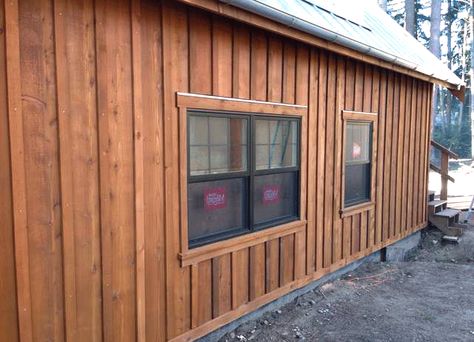 Board And Batten Siding Stained, Board On Board Siding, Board And Batten Cedar Siding, Cypress Board And Batten Siding, Board And Batt Siding, Board And Batten Cabin Exterior, Board And Batten Wall Wood Stain, Exterior Wood Accent Wall, Wood Board And Batten Exterior