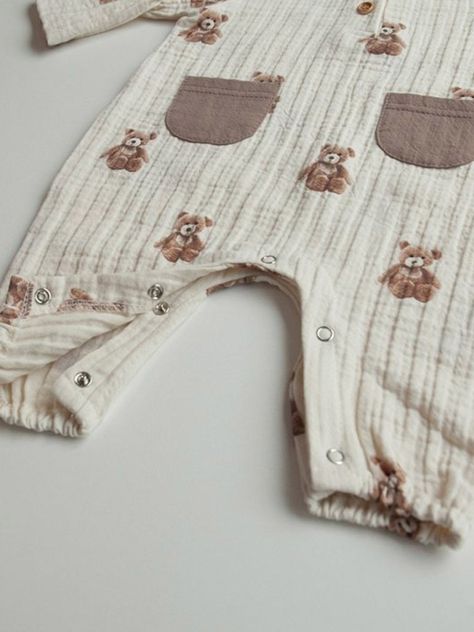 Double the cuteness with this adorable jumpsuit! Featuring soft, breathable fabric with small teddy bear prints throughout. Snap buttons at bottom for easy changing.Made in South Korea Baby Bear Nursery, Small Teddy Bear, Baby Boy Bear, Teddy Bear Nursery, Baby Pjs, Small Teddy Bears, Neutral Baby Clothes, Bear Nursery, Baby Shower Dresses