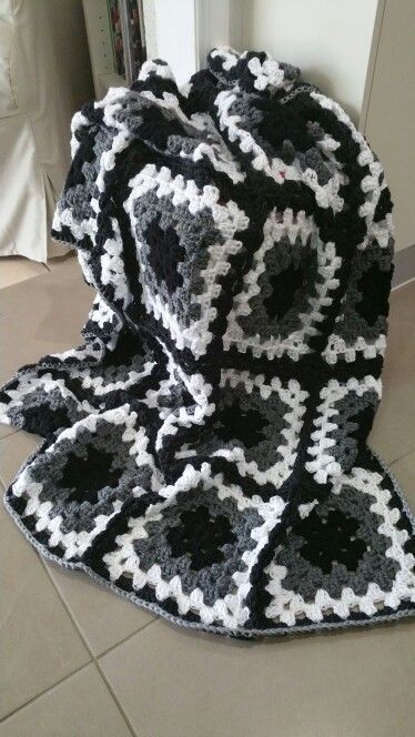 Chunky & Chic: Quick Crochet Blanket Ideas for Home Comfort Monochrome Granny Square Blanket, Granny Square Blanket For Men, Monochrome Granny Square, Monochrome Crochet, Crochet Blanket Grey, Quick Crochet Blanket, Crochet Blanket Ideas, Granny Square Crochet Patterns Free, Crochet Fairy