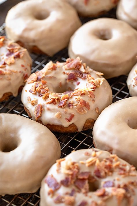 These maple donuts rival the best gourmet donut shop’s version, and come with an optional topping of crispy bacon! | thecozyapron.com #mapledonuts #mapledonutsrecipe #mapledonutswithbacon Maple Donuts Recipe, Gourmet Donut, Donuts Aesthetic, Maple Bacon Donut, Maple Donuts, Sweet Fries, Donut Batter, Bacon Donut, Donuts Donuts