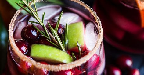 10 Festive Holiday Drinks | The Modern Proper Christmas Sangria Recipes, Margarita Mix Drinks, Cranberry Mocktail, Cranberry Sangria, Holiday Mocktail, Festive Holiday Drinks, New Year's Drinks, Easy Mixed Drinks, Holiday Sangria