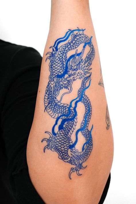 27 Dragon Tattoos For Women Ink Dragon Tattoo, Ink Dragon, Blue Dragon Tattoo, Dragon Tattoo Stencil, Blue Ink Tattoos, Red Dragon Tattoo, Dragon Tattoos For Men, Bookish Tattoos, Dragon Tattoo For Women