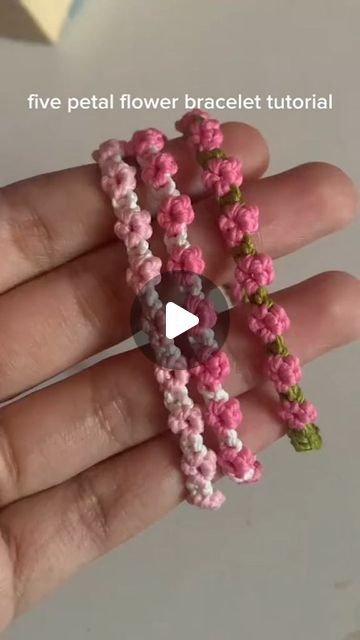 Crafty Canvas on Instagram: "Blossom your style with this DIY five-petal flower bracelet! 🌸✨ Handcrafted elegance at your fingertips. Each petal a testament to creativity, making your wrist a canvas of floral delight. Embrace the art of crafting, wear nature's beauty, and let your accessories bloom! 🌼🌿

#DIYCraftsUSA#HandmadeInAmerica#CraftingUSA#HomemadeCraft#ArtisanCrafts#HandcraftedInUSA#AmericanCraftsmanship#DIYDecorUSA#CreateInAmerica#CraftyAmericans#USAMakers#HandmadeHomeUSA#DIYArtistry#CraftyCreatives#HomeCraftedUSA#ArtistsInAmerica#USADesigns#DIYHobbiesUSA#CraftersOfAmerica#HomeArtisan#DIYGiftsUSA#DIYCraftingUSA#tutorial#reels#explore#diy#explorepage#art#draw#giftideas" Diy Charm Bracelet Ideas, Flower Bracelet Diy, Bracelet Game, Crochet Bracelet Tutorial, Bracelet Making Tutorial, Homemade Accessories, Diy Friendship Bracelets Tutorial, Yarn Bracelets, Homemade Bracelets