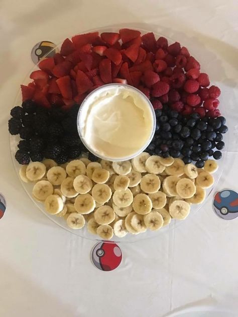 Pokémon birthday party Pokeball fruit tray Pokemon Fruit Tray, Gender Reveal Ideas Pokemon, Pokemon Gender Reveal Ideas, Pokemon Gender Reveal, Pokemon Baby Shower Ideas, Nerdy Gender Reveal, Pokémon Birthday Party, Pokemon Party Decorations, Pokemon Birthday Cake