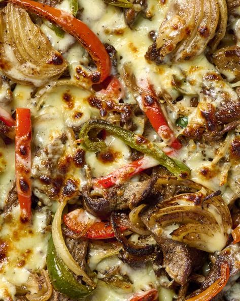 Philly Cheesesteak Skillet Recipe | The Kitchn Philly Cheese Steak Skillet, Philly Cheesesteak Skillet, Iron Meals, Steak Meals, Cheesesteak Skillet, Steak Skillet, University Food, Boneless Ribeye Steak, Sauteed Peppers And Onions