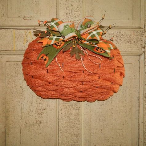 Halloween Pumpkin Wreath That I Made It Is Done In An Orange Burlap On A 3d Pumpkin Work Form In A Basket Weave Style It Sits Out Off The Door Or Wall In A 3d Look. I Have Added The Matching Truck Ribbon Along With Plaid And Pumpkin Ribbon. Accented With Burlap Leaves, Berries And A Little Raffia. The Stem Is Done In Beige String. It Is Hard To Always See The Stem Due To The Bows And Accessories That Are Added And The Way The Pumpkin Is Formed. I Have This One Ready To Go And I Will Be Adding Different Ones To My Store. Measures Approx 15" Tall X 19" Wide And 5" Deep This Item Needs To Be Hung Under A Porch Or Inside Out Of The Weather To Get Longer Use Out Of It. Dollar Tree Pumpkin Wreath, Burlap Leaves, Pumpkin Wreath Diy, 3d Pumpkin, Burlap Pumpkins, Dollar Tree Pumpkins, Crochet Wreath, Wreath Project, Dollar Store Diy Projects