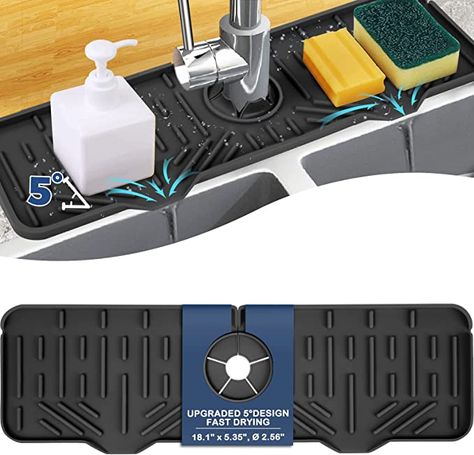 💪【MULTIFUNCTION】 It's not only a faucet drying mat, it also a sponge holder for kitchen sink, dish soap tray, dish drying mat. For kitchen: put sponge, dish soap, detergent, brush, and bottle on it. Upgrade the size of the increase, you can put more kitchen small things. Make your sink cleaner. Used as an organizer mat, drain pad. It is a super practical kitchen & bathroom gadgets! 💪【KEEP YOUR COUNTERTOP DRY】 While other kitchen faucet sink splash guards are made from hard-to-clean fabric that Faucet Splash Guard, Organize Kitchen Sink, Dish Soap Tray, Sponge Holder Kitchen, Dish Sponge Holder, Faucet Mat, Sink Protector, Bathroom Gadgets, Kitchen Sink Accessories