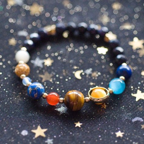 Now, one lucky Susan Said… WHAT?! reader will win this Solar System Bracelet. It’s a snap to enter using our Rafflecopter form. ขวดโหล Mason Jar, Solar System Bracelet, Planet Design, Bracelets Design, Cats Eye Stone, The Solar System, Apollo Box, Handcrafted Bracelets, Our Solar System