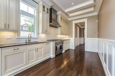 kitchen with white wainscoting and wood floor Kitchen With Waynes Coating, Wainscoting Kitchen Walls, Wainscoting In Kitchen, London Flat Kitchen, Kitchen Wainscoting Ideas, Kitchen Wainscoting, Waynes Coating, Wainscoting Kitchen, Two Tone Walls