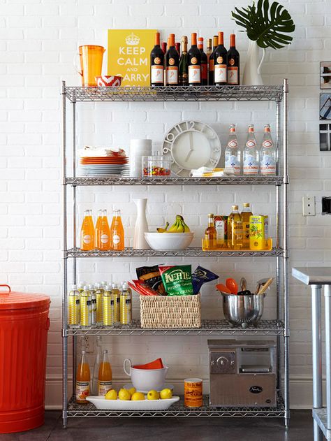 This open shelving design offers easy access to cooking and baking needs. More kitchen pantry design ideas: http://www.bhg.com/kitchen/storage/pantry/kitchen-pantry-ideas/?socsrc=bhgpin080113openpantry=14 Industrial Metal Shelving, Extra Kitchen Storage, Desain Pantry, Metal Shelving, Metal Shelving Units, Design Blogs, Small Apartment Decorating, Apartment Life, Pantry Design