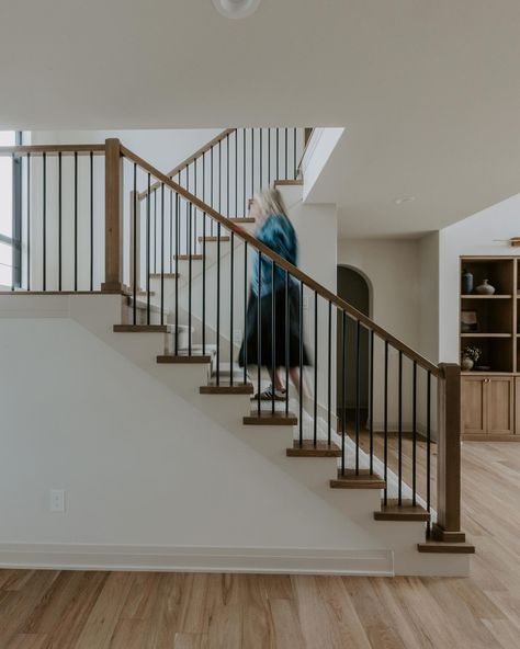 Walking into the new week like…🖤 Read below for some of our favorite features to implement into stairs for an elevated look: - Opt for a… | Instagram Houses With Stairs In The Middle, Switch Back Staircase Ideas, Stairs In Middle Of House, Stairs In The Middle Of The House, Open Switchback Staircase, Switch Back Staircase, Wooden Open Stairs, Small Grand Staircase, Back Staircase