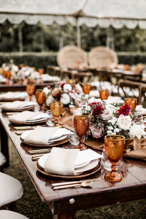 Dramatically Beautiful Moli'i Gardens Wedding in Honolulu | Junebug Weddings Amber Glass Table Decor, Amber Glasses Table Setting, Colored Glass Table Setting, Amber Glass Table Setting, Amber Glasses Wedding, Table Setting Photography, Amber Table Setting, Amber Wedding Color Palette, Amber Glass Wedding