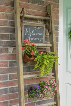 How to make a vertical garden and welcome sign from a ladder, terra cotta pots, and floral wire. Ladders In The Garden, Garden Ladder Ideas, Vertical Garden Flowers, Ladder Garden, Ladder Planter, Ladder Ideas, Garden Ladder, Plant Ladder, Garden Planters Diy